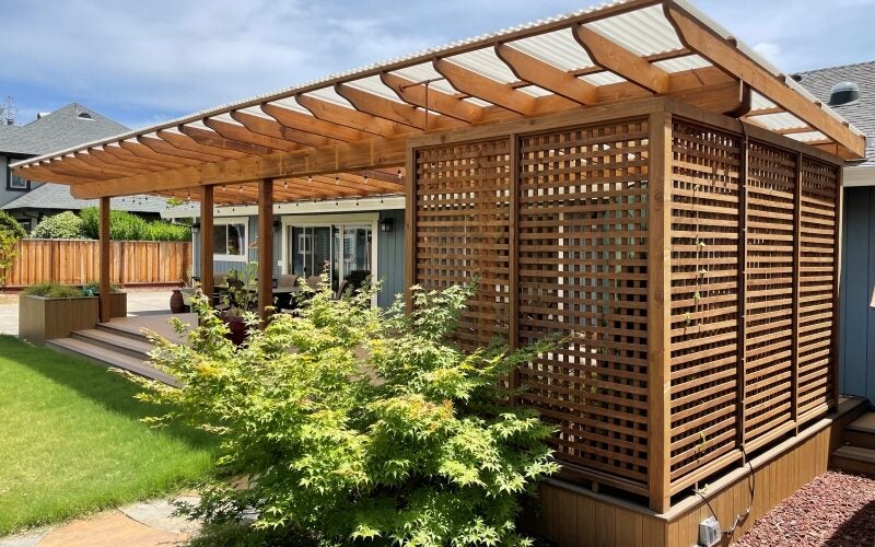 A rectangular deck with modern wooden shading